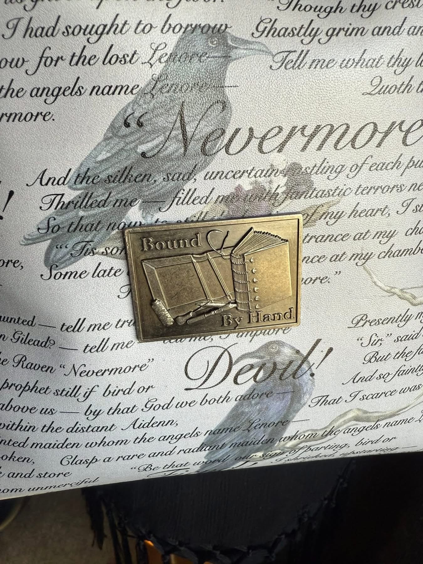 A Quaint Poe Bag Stitched of Beauty and Dread
